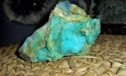 Opal-This is a Beautiful piece of polished Opal that comes from the country Peru. Colors blue/green. Measurements 3? Tall 5? Wide 2 1/2" Thick. Opal known as "The Gem of the Gods," Opal has always had a mystical significance. Opal is thought to aid in