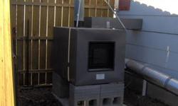 Save on your heating bills year after year! Lil House outside wood furnace. A forced air system that heats up to 2400 square feet of space, rated 100,000 BTU. Houses, mobile homes or shops can heated with one of these units. Usually you fill them 2x a