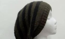 The colors of this hand knitted oversized beanie hat are dark olive green and black stripes. It is made with a soft pure wool (the olive) yarn and the black stripe is acrylic. The black yarn has a little fuzzy effect. Worn by men or women. Unisex.