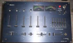 This Vintage DM1800 Numark mixer is from the early 1980?s. I purchased it in 1980 when Numarks where popular among DJ's. This single owner mixer powers up when turned on and is available for parts.
It has three phono inputs so you can connect three