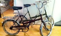 Two 1971 Raleigh 20 three-speed folding bicycles, in perfect working condition with all original parts except tires. One red/brown, one green. Frames in beautiful shape - no rust, only minor scratches, original decals. Chrome fenders with rear reflector,