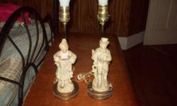 This is a "VINTAGE " PAIR OF BISQUE PORCELAIN FIGURINE COUPLE. THEY MEASURE 14" high, { with bulb & shade 18 1/2 " } They are GREAT FOR DRESSER TOP! Pre 1940 Great Condition Work well. No CHIP OR CRACKS NOTED. SHIPPING TO BE PAID BY PURCHASER ,OR PICK UP