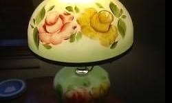 Selling this beautiful painted glass parlor lamp. Perfect condition. The top and bottom are both painted in the same style, though only on one side. The other side is a plain light-green glass, so if you turn it around, it doesn't show the hand-painting,
