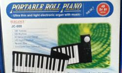 Portable roll up piano by Elegance, brand new, still in the box.
Has 128 rythms as well as 60 demonstration songs. LED displays and record and play options.
External speaker output/ earphone jack/adapter.
Be the star at your party.