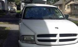 I have a 2001 Dodge Durango
Color: White
Mileage: 151,xxx
Engine: V8
The Good: New rear differential, new front shocks, a/c, power everything, cruise, blazing hot heater for cold Winters, 3rd row seating, new back brakes, new front brakes
The Bad: Needs