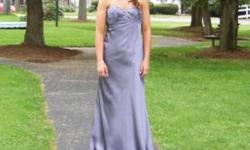 I have a beautiful charcoal gray prom dress. size 10. only worn once perfect condition. Asking $150 or best offer.