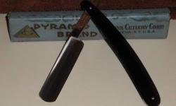 Pyramid Brand #12 In Box Geneva Cutlery NY
RICHARDS RAZORS; MAKE ME AN OFFER I CAN'T REFUSE!
This great razor is a 6/8" #12 Geneva Cutlery, Pyramid brand straight razor.
Razor reads: Geneva Cutlery Corp Geneva, N.Y. U.S.A. The scales and razor
are in very