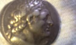 Ancient Greece Demetrios I to III half shekel and shekel 161 BC to 88 BC.....Silver
but.................now finding out it could be a Tetradrachm - Ptolemy III