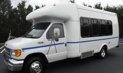 2002 FORD E-350 Startrans shuttle bus with 17 passenger capacity plus driver (can be reconfigured as a Non-CDL bus). The low mileage 5.4L V-8 Triton gas motor was well mainted and taken care of by its only previous owner.This shuttle bus looks great and