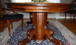 Very unique Renaissance revival Table with 6 leaves , each 16" wide. This is a magnificent table perfect for large family gatherings and is in EXCELLENT CONDITION.