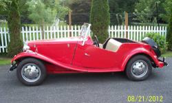 fibreglass body replica 1952 mgtd
nice bright red replica car built on a 1973 vw chassis
1600cc engine and 4 spd manual trans...looks great and
runs out 100% ...fun car to drive