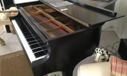This piano is in excellent playing condition!