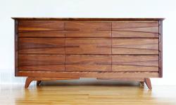 Walnut 9 Drawer credenza or dresser by Vic-Art. Great quality and lots of character. This piece screams Mid-Century Modern, for a reasonable price. Cash or PayPal accepted. Local delivery available.