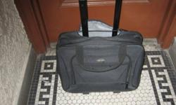 This Olympia 16 inch wheeled luggage was used one time very briefly. The price is $51.
The handle on the luggage rises to a height of 25 inches. The buyer should determine that this height is suitable to his needs.