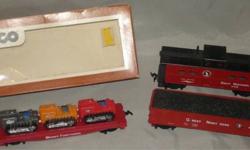 USA SHIPS FREE!
For sale is a lot of three (3) HO Scale GREAT NORTHERN ROLLING STOCK.
You will receive:
* 1 - TYCO - 40' Skid Flat Car with 3 Tractors (has all detail parts) in the original box (plastic window partly off); Tyco item #351-B - tractors are