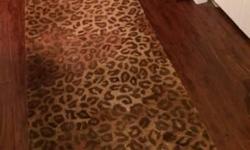 All over leopard print hand-made, 100% wool pile rug runner.
Perfect for long hallway.
Size: 11 ft. 10 inches x 2 ft. 3 inches
$75(originally $350)