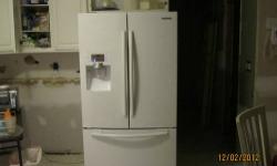 Excellent condition SAMSUNG 3 door refrigerator.
in door ice /water
Model RFG297
White
28.5" Cu ft
35" D
70" H
35 3/4" W
Item is in excellent condition. Sold as is. Reasonable offers accepted.