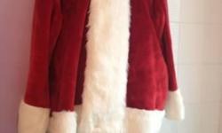 Santa Claus costume. Santa Clause thick and furry jacket, pants, stomach belly harness and toy bag. One owner. This is one of the good quality costumes. Cash only. Pick up only. Midtown West.