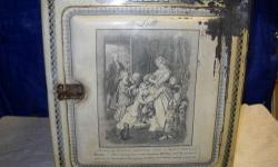 "Schepp" Lithograph Painted Tin Cake Box
Late 19th century to early 20th century
Moderate condition, with shelf
Dimensions 14 Height x 13 Width x 11 Depth
Decorative images with inscriptions -
Front image "Lotte" Goethe "Sorrows of Werther" painting by