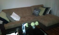 Selling a great sectional couch set- there are 2 pieces- the sofa and the divan so it is easy to move. The sofa folds out into a bed. Chocolate brown and beige contrast color. Microfiber; looks like suede. Great condition but shows some wear. There is
