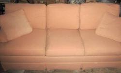 Beautiful 2 piece sectional sofa in excellent condition.. From a smoke and pet free home.. Color is sage green. Only 2 yrs old.