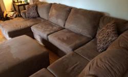 We have had this sectional sofa with ottoman for 1 yr. We are moving to a smaller apartment from a house and need to sell this. It is excellent condition. Cash only or certified check. You will have to pick it up. We can help in loading it on your