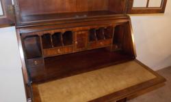 DREXEL Flame Mahogany Secretary Bookcase Desk
This is a DREXEL Flame Mahogany Secretary Bookcase Desk. This is an outstanding and hard-to-find example from Drexel. WIll date from the 1960s or 70s and is from their famous et Cetera Collection. The