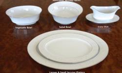 7 piece EXQUISITE place setting... still on sale if new over $1,100.
Additional Pieces:
Vegtable Bowl
16" Serving Plater
14" Serving Plater
Gravy Boat
Oval Bowl
Grey subtle pattern on white background....