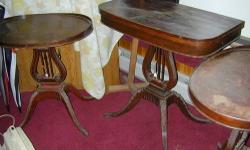 I believe these are 1900-1950's era they do need some refinishing. end table approx 27" tall 24" x 15" top folding top table is 30" tall top 1/2 is 29" x 18" lire or lyre base flip top for gaming or small apartment prefer to sell as a set asking $949 or