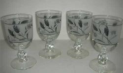 ?? SET OF 4 LIBBEY SILVER WHEAT WATER GOBLETS
SET OF 4 LIBBEY SILVER WHEAT WATER GOBLETS: Water Goblet in the 3003-12 pattern by Libbey - Rock Sharpe, Stem #3003 Silver Wheat Design On Bowl. They stand 5 Â½ inches tall, 3 inches around at the base and top,