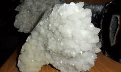 Milky Quartz Crystal Cluster from Diamond Hill Mine South Carolina. This is a shiny milky Quartz crystal cluster. It makes a great display piece. Its origin is Diamond Hill, South Carolina. Some of the most unique quartz comes from Diamond Hill. Crystal