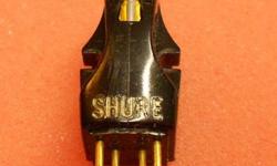 The original stereo cartridge by Shure, the M3D.
This original version is in near mint shape, and working perfectly.
I don't remember if this has the original stylus or a replacement, but it is in perfect shape.
In it's original early container with