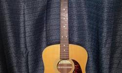 For sale or trade is a Sigma Dm-2 Acoustic Guitar and a Levy's Em-20 soft-shell-case. This was the first guitar I had and loved every second with it. I am selling it because I was given another one for Christmas.
The Guitar is in great shape and still
