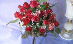 SILK FLOWER ARRANGEMENTS - beautiful in home, office, lobby, desk, church altars. Realistic looking, quality flowers, artistically arranged in interesting holders. Cheerful and uplifting, and best of all, permanent. Buy once, admire for decades, dust