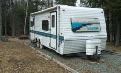 1995 27ft, self contained, sleeps 6,with 2 doors, full sized awning , central heating & air conditioning , 2 door refridge , under counter coffee maker,microwave , 3 burner range with oven , built in radio , bath with shower, sink ,toilet, medicine