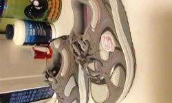 Preowned. Like new,used twice, size 7 1/2. Silver grey/ pink