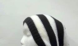 Slouch hat is knitted in black and white 1 Â½ stripes This slouch hat is a medium thickness, (not heavy) very stretchy, will fit any head, will stretch out to 31 inches around. Worn by men and women. Large size. The measurements are lying flat on a table.