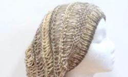A fun open weave hat. This slouchy beanie hat is the colors of tan and brown variegated colors and is knitted with acrylic yarn which is very soft. The measurements are (lying flat on a table)are 9 Â½ inches across the ribbing, 12 inches wide and the
