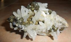 Small Crystal on Pyrite from Peru-This is a Perfect Specimen of Clear White Lustrous Crystals and Gold Rust Cube Pyrite Crystal in the front. Measurements 1 Â¾? Tall, 3? Wide and 1 Â¼? Thick and come from the country Peru. This would make a great item to
