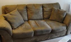 Brown microfiber sofa, 84" long, 3 cushion, comes with 2 throw pillows. Asking $250. Excellent condition.