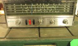Solid State 4-Band Table Radio
Midland International
Model 11-500
AM / Shortwave
AM / SW1 / SW2 / SW3
9 Transistors, 3 Diodes
Shortwave Electrical Fine Tuning
Lighted Slide Dial
4" Speaker
Note: one of the buttons is stuck on "receive" (radio can't