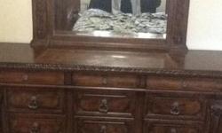 4 piece solid wood bedroom set. King size bed with four posts. Two side dressers and one full dresser with mirror. Kept in smoke-free and pet-free home. Dimensions upon request.
Original Price $6500