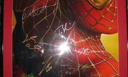 Hi. Up for sale is an original Spider-Man 2 27 x 40 movie poster. With the frame it measures 31 1/4 x 44 1/4. It's been signed by cast and crew and professionally matted (red) and framed with glass and a black metal frame. Comes with COA/provenance. The
