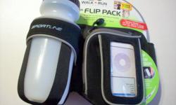 Sportline Hydration Flip Pack
Flip View Design - Lift Sleeve To Easily View & Change Controls
Use With Any Sized IPod, MP3 Player Or Cell Phone (Not included)
Storage Pocket For Small Stuff
BPA Free Sport Bottle Holds 20 oz
Reflective Trim For Enhanced