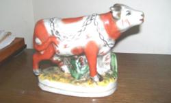 Very nice Staffordshire cow figurine. No chips or cracks. 7-1/2" long 6" tall Call 845-754-7233 CASH OR PAYPAL FREE shipping with FULL payment CONTINENTAL USA