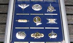 STAR TREK OFFICIAL INSIGNIA COLLECTION IN MINTED SILVER AND GOLD --- AUTHORIZED/LICENSED BY PARAMOUNT PITCURES; AUTHENTICATED BY STAR TREK CREATOR, GENE RODDENBERRY
**PREMIUM COLLECTIBLE FOR TREKKIES - READY FOR HANGING IN DORM ROOM, DEN OR FAMILY ROOM