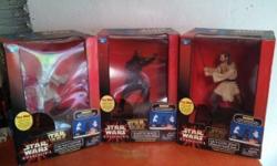 Star war banks never been out of the box hook them together and when you put change in the fight with each other asking $90.00 or best offer