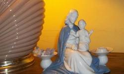 "NOT A SPAMMER" must be in your first line email or I can not answer.
Lady with baby, Madonna and infant, double candle holder. Vintage German.
FROM THE NET:....fine and rare german art deco porcelain statue of madonna and child , virgin mary and infant