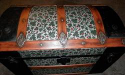 Antique trunk with tin inlay on lid. Trunk is in good shape. No handles but hardware is there. Size is 17x20x30.