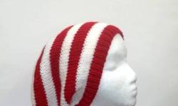 The colors in this stripe beanie are red and white stripes. It is made with a soft acrylic yarn. Stretches out to 31 inches around.Comfortable hat. Great for the Holidays. Large size. Available at: http://www.CaboDesigns.etsy.com